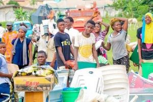 Suspected looters and the stolen items