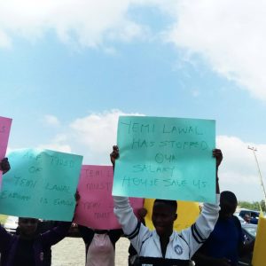 The Sports Stakeholders carrying placards at the Osun State House of Assembly against unpaid salaries