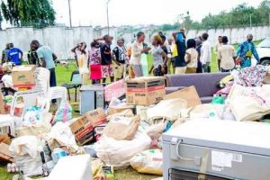 Arrested residents and their loots in Osogbo
